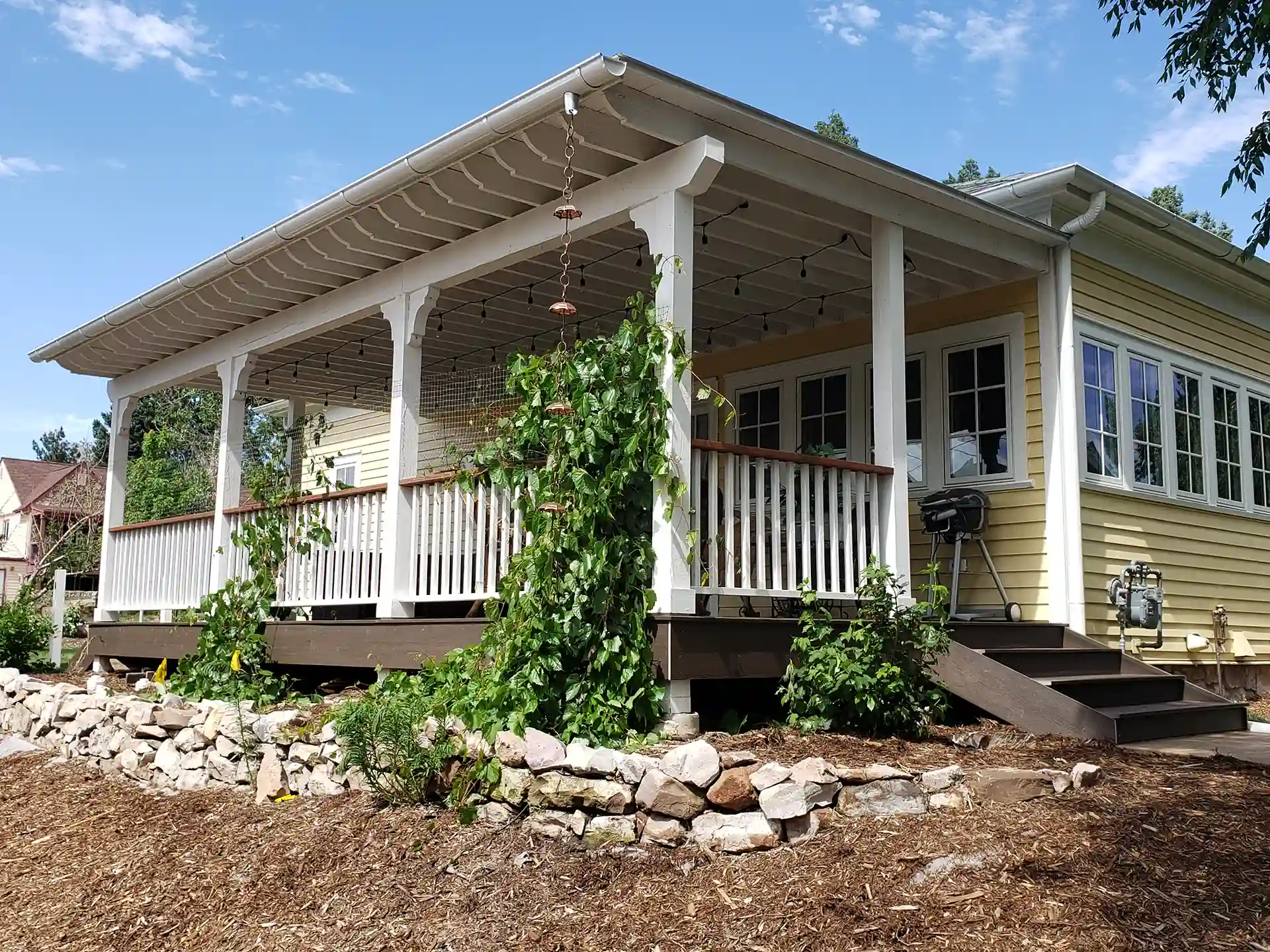 photo of a deck with growing climbing plants to provide deck privacy 