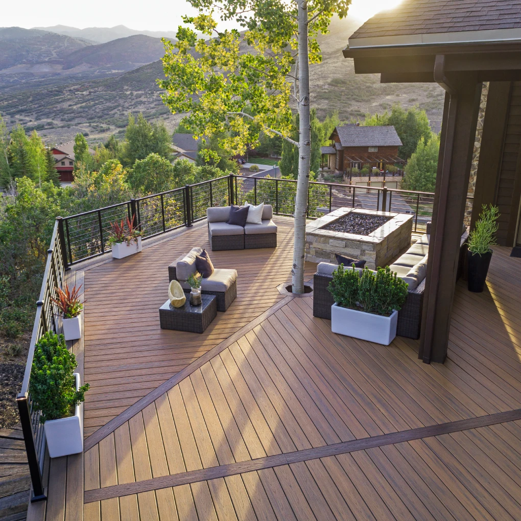 aerial-view-of-the-composite-deck-with-outdoor-living-lounge-and-decorative-potted-plants-with-cable-railing-featuring-overlooking-mountain-view-in-castle-rock-co