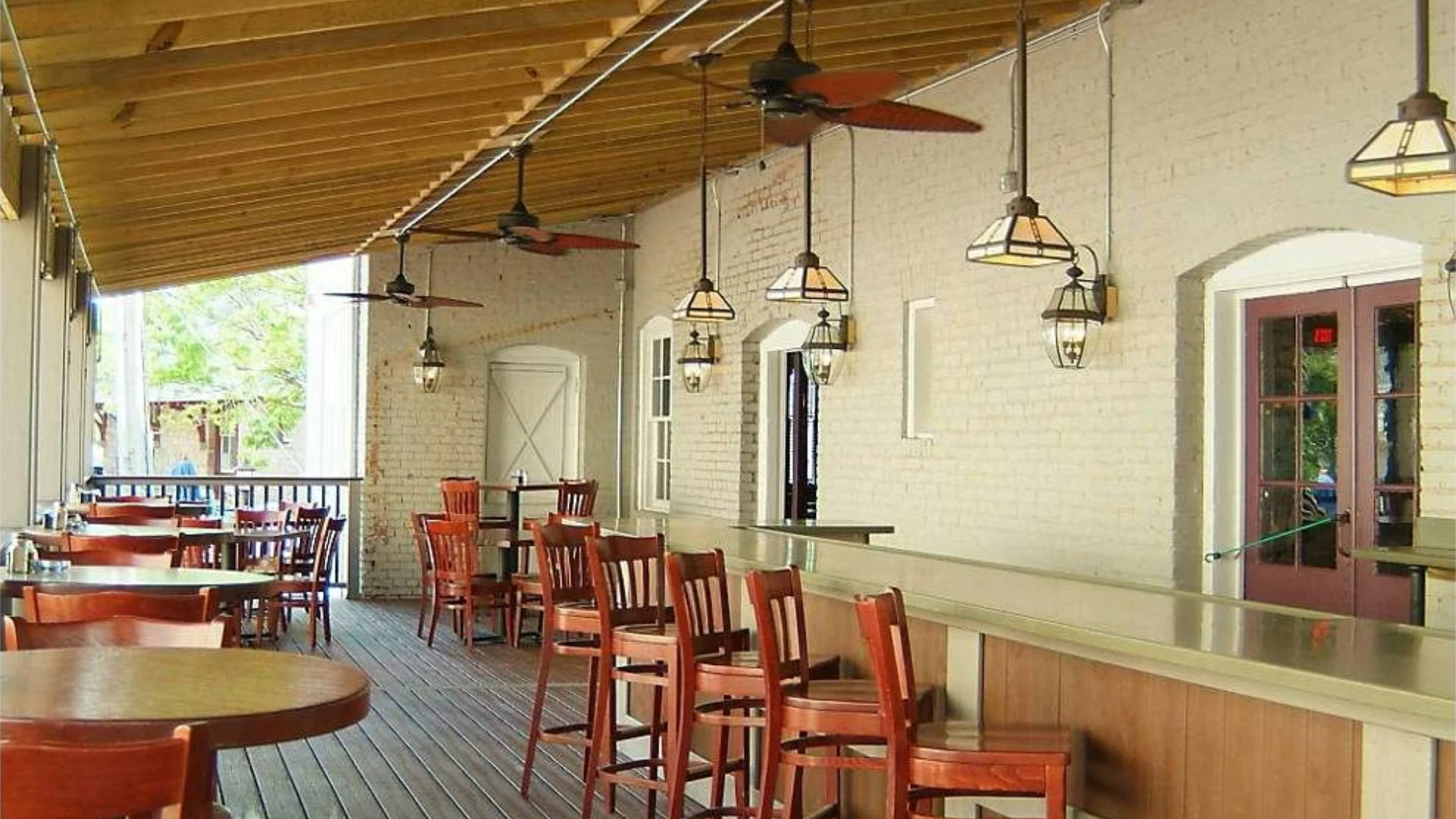 commercial-decking-on-the-residential-restaurant-with-multiple-fan-and-hanging-lights-on-the-ceiling-in-castle-rock-co