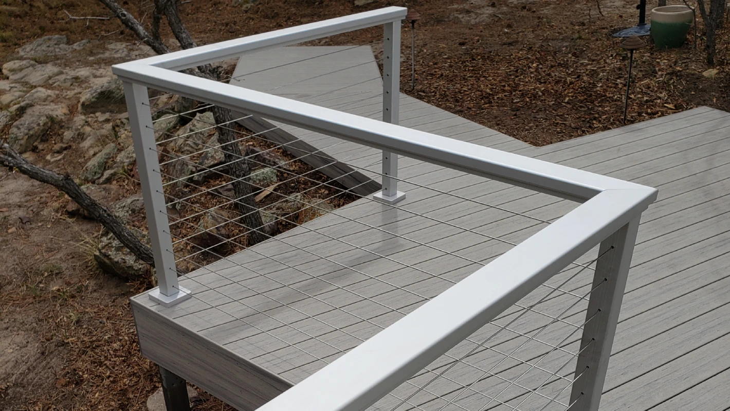 gray-custom-residential-deck-with-walkaway-and-cable-railing-in-castle-rock-co