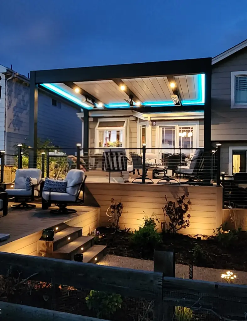 multi-level-deck-with-skirting-and-post-cap-lights-with-deck-lights-and-outdoor-living-dining-set-area-with-modern-louvered-cabana-in-castle-rock-co