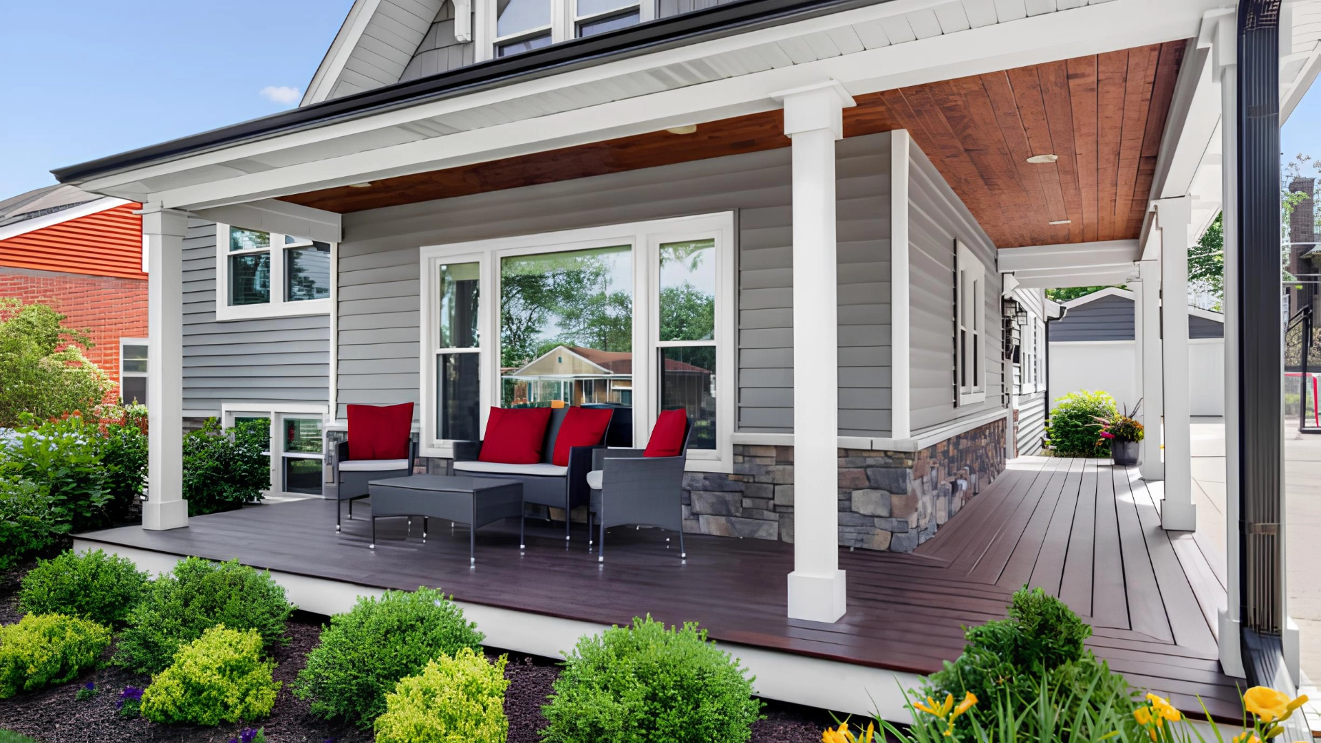 porch-on-the-side-of-the-house-with-outdoor-living-sofa-surrounded-by-greenery-in-castle-rock-co