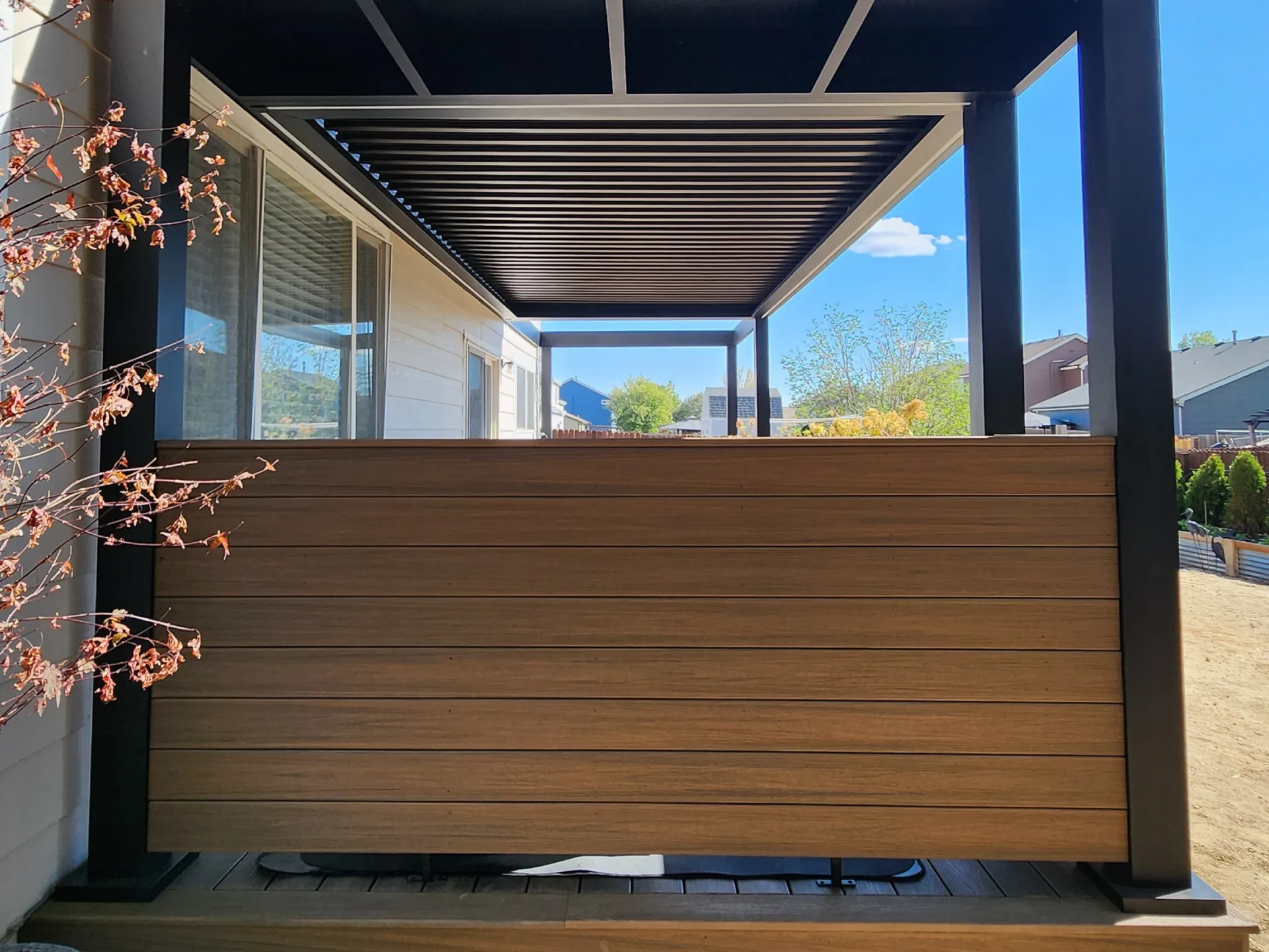 wooden-privacy-screen-on-the-long-louvered-pergola-on-the-residential-house-in-castle-rock-co